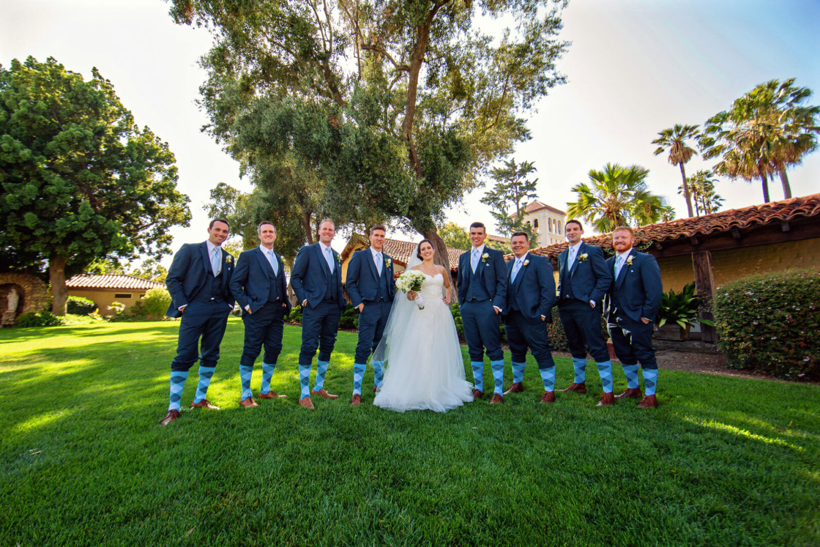 A bride standing together with some boys