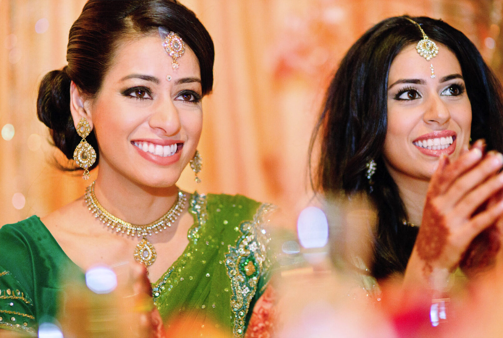 Close up image of two ladies smiling at the camera