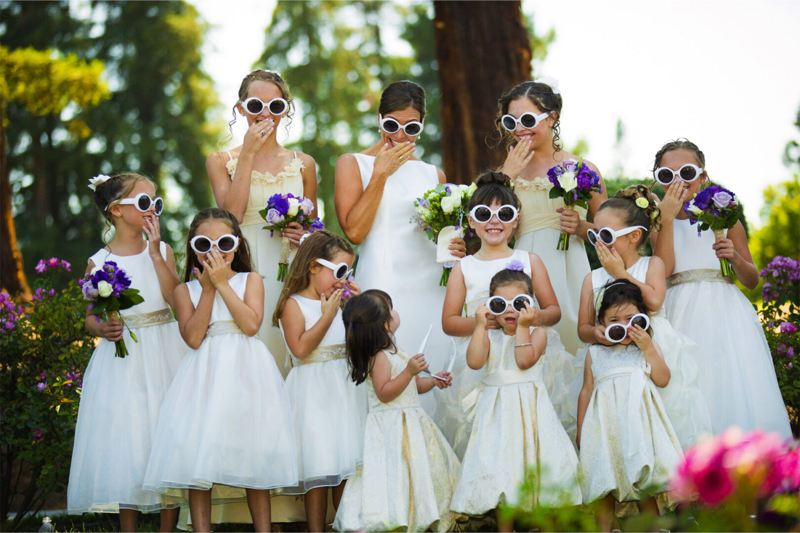 Children wearing the wedding dress