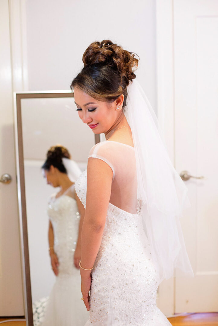 A new bride along with a white color dress
